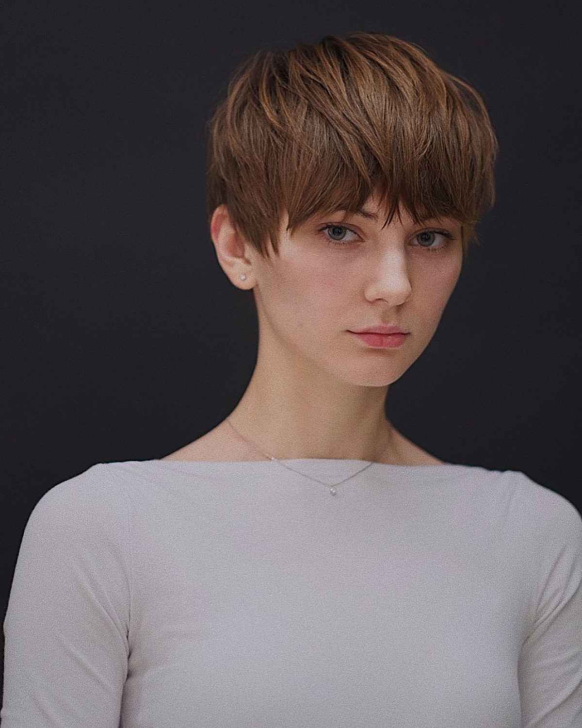 Layered Pixie with Heavy Bangs