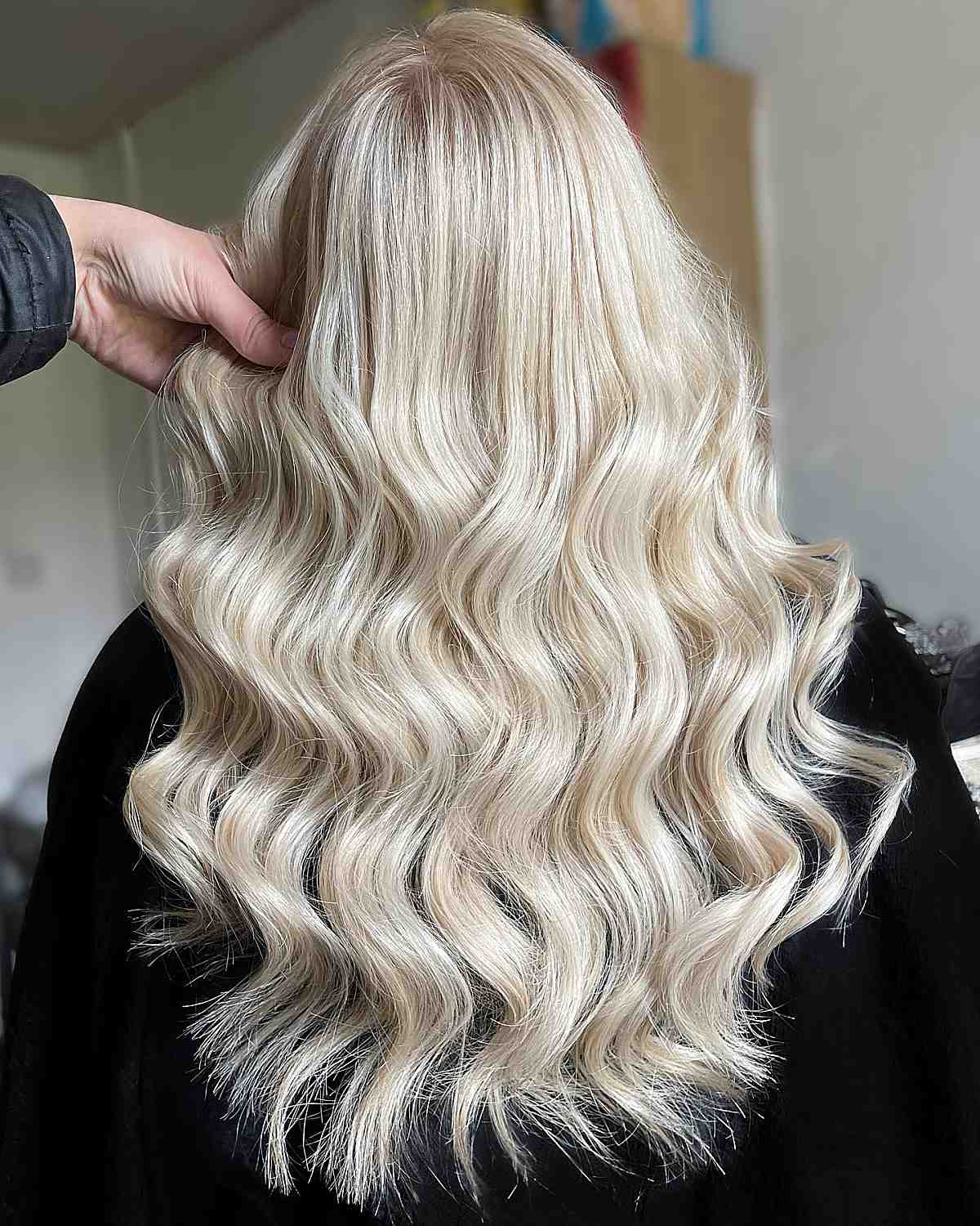 light blonde icing balayage on longer hair
