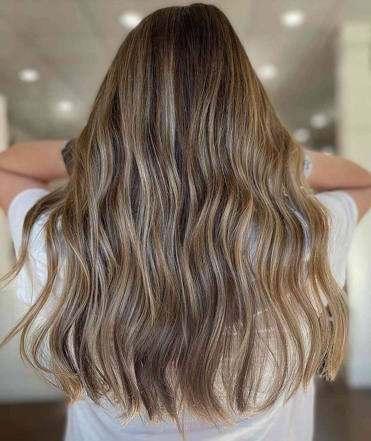 Light Brown Hair with Platinum Highlights and a Partial Balayage