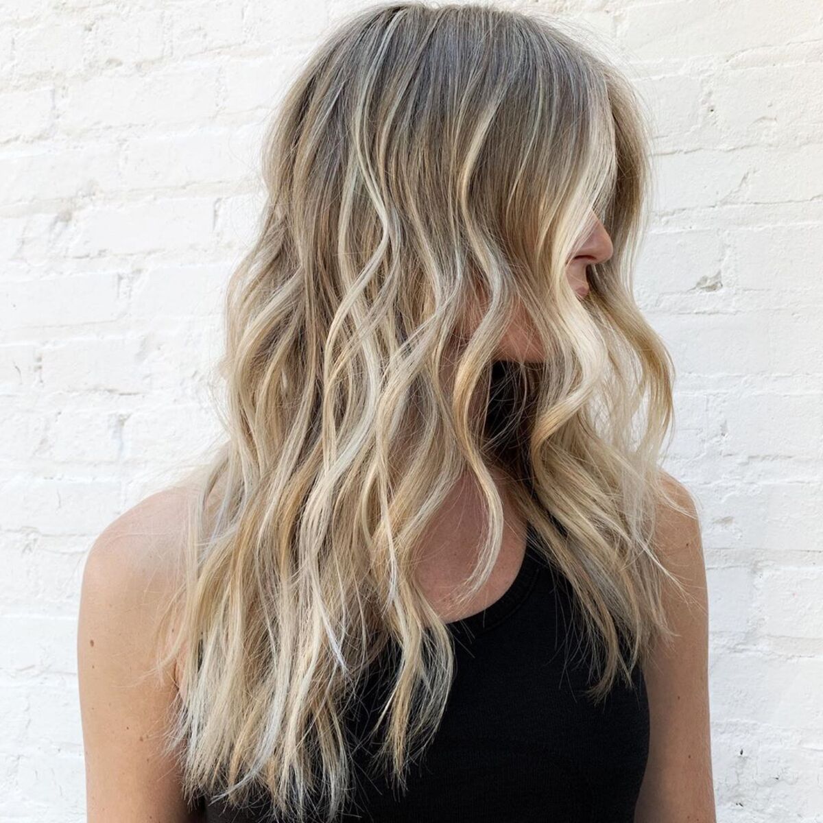 Light Brown to Blonde Ombre with Face-Framing Highlights