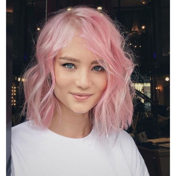 Light Pink Wavy Haircut With Messy Curls
