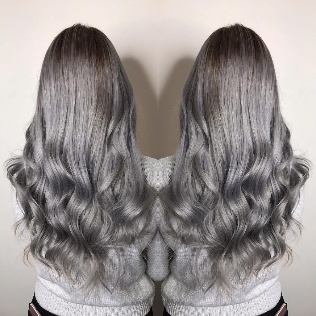 Long ashy balayage hair with soft curls