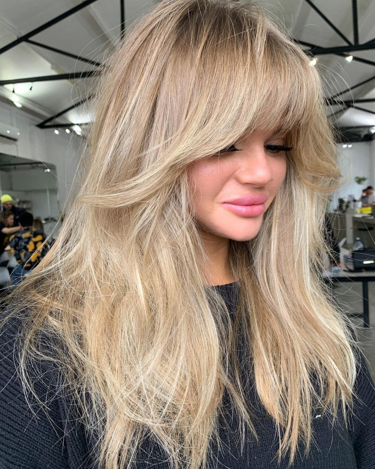 Long Blonde Hair with Bangs and Short Layers