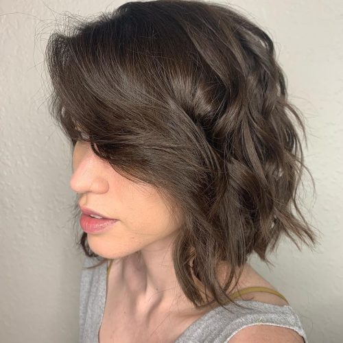 Long bob with layers and bangs to the side