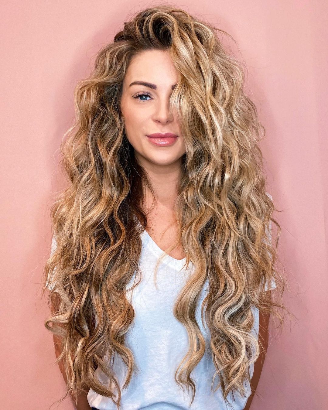 long curly dark blonde hair