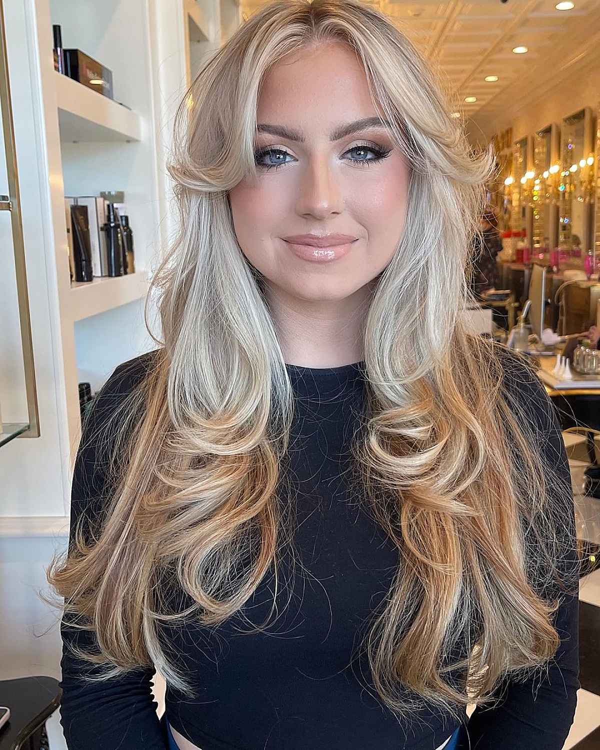 Long Curtain Fringe on Layered Blonde Hair