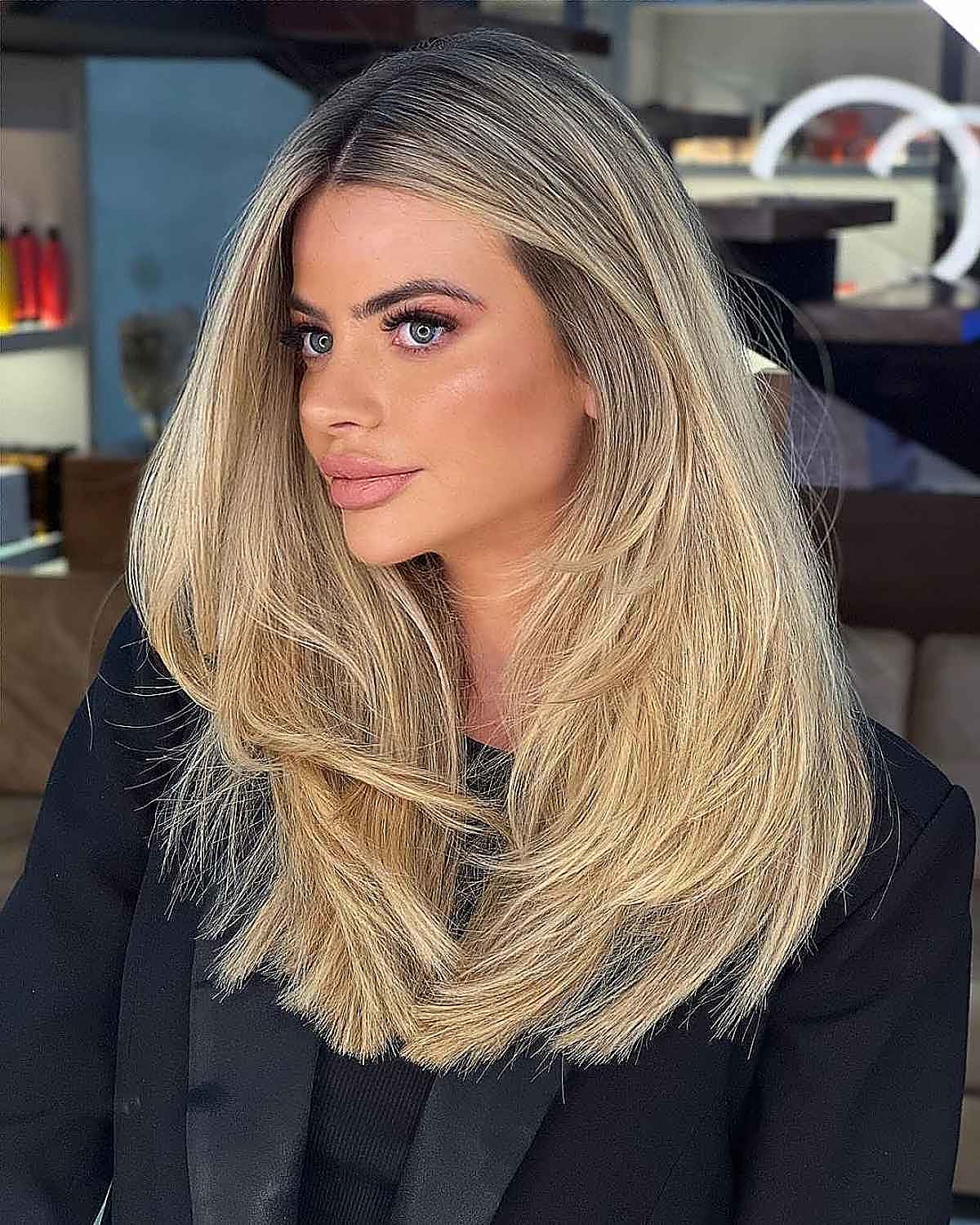 long layered straight blonde hair with middle part