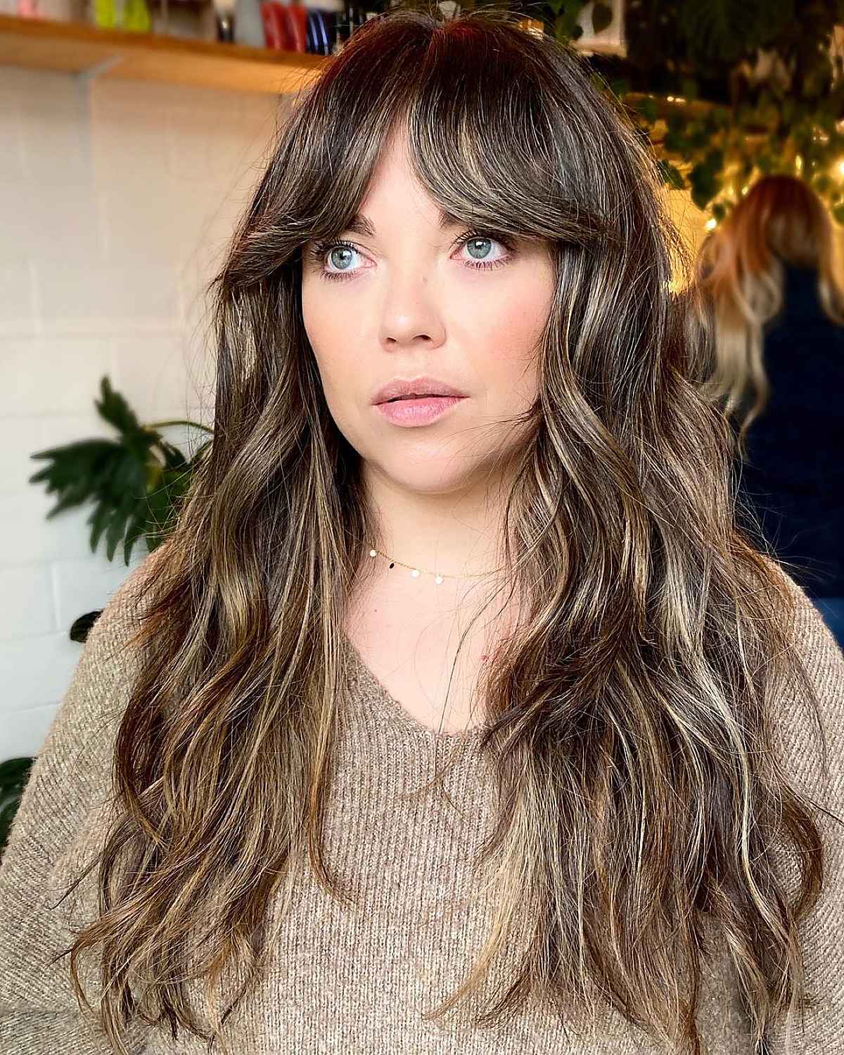 Long Sun-Kissed Hair with Bardot Bangs