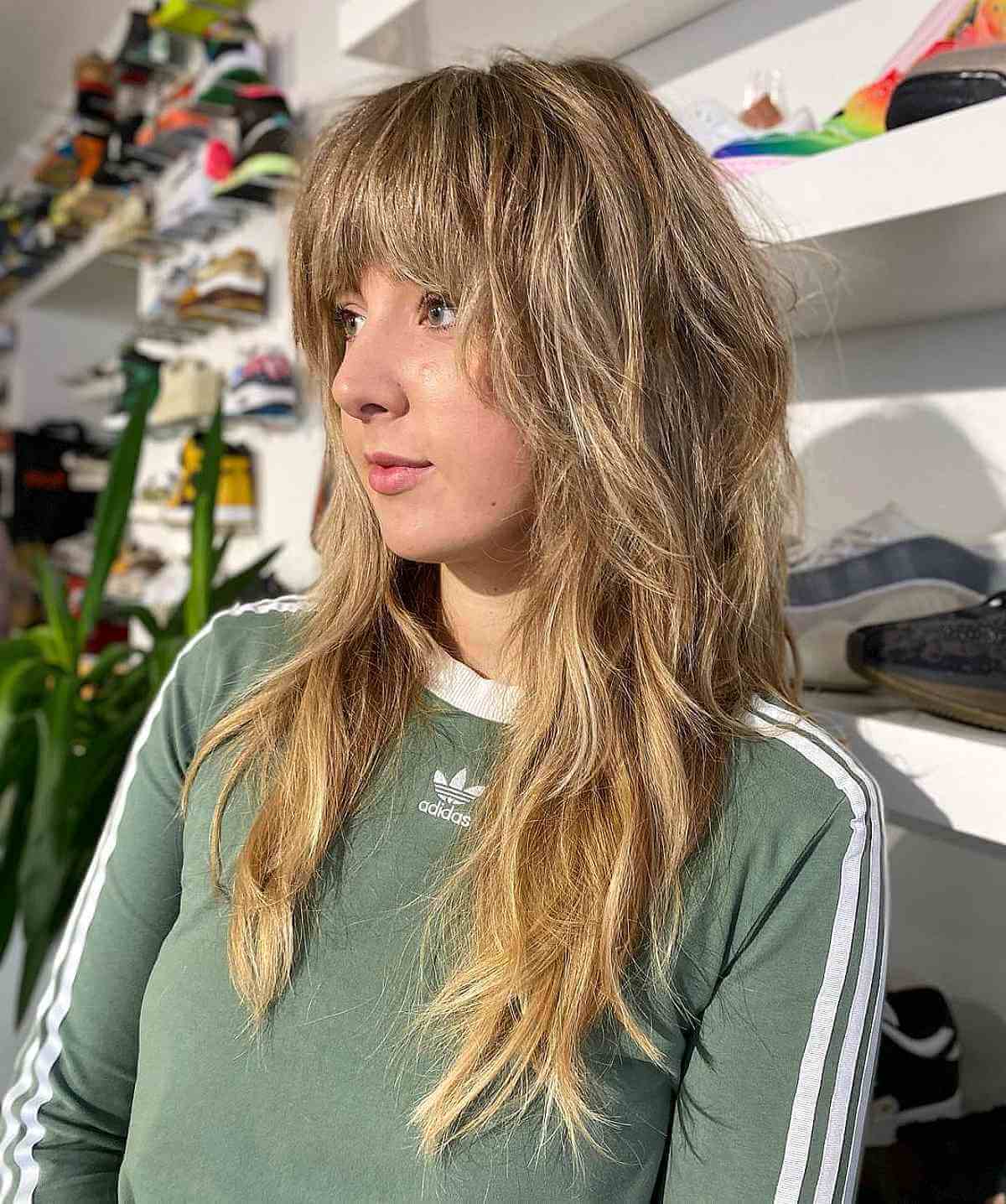 Long Tousled Shag Cut with Fringe Bangs