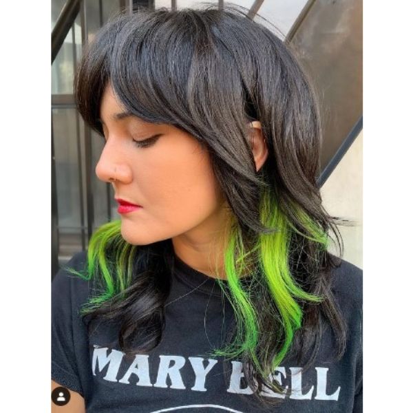 Medium Haircut With Neon Green Highlights And Subtle Waves