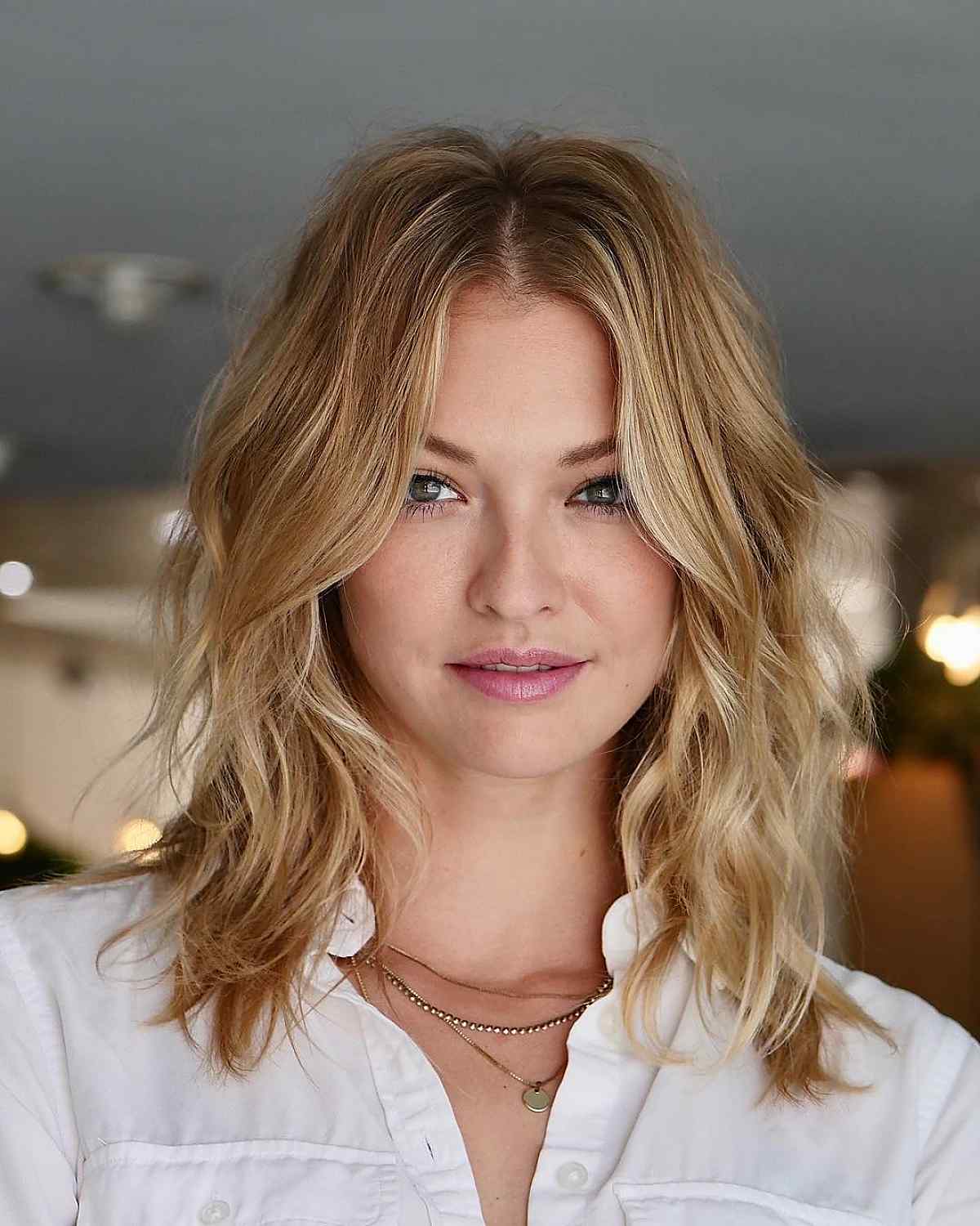 Medium-length golden blonde wavy hair for thick hair