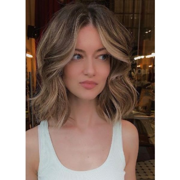  Medium Long Haircut With Face Framing Blonde Highlights