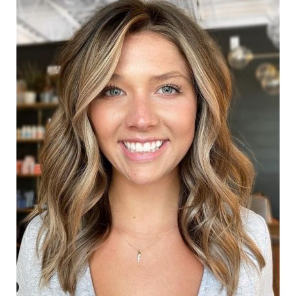 Medium Long Haircut With Front Blonde Highlights