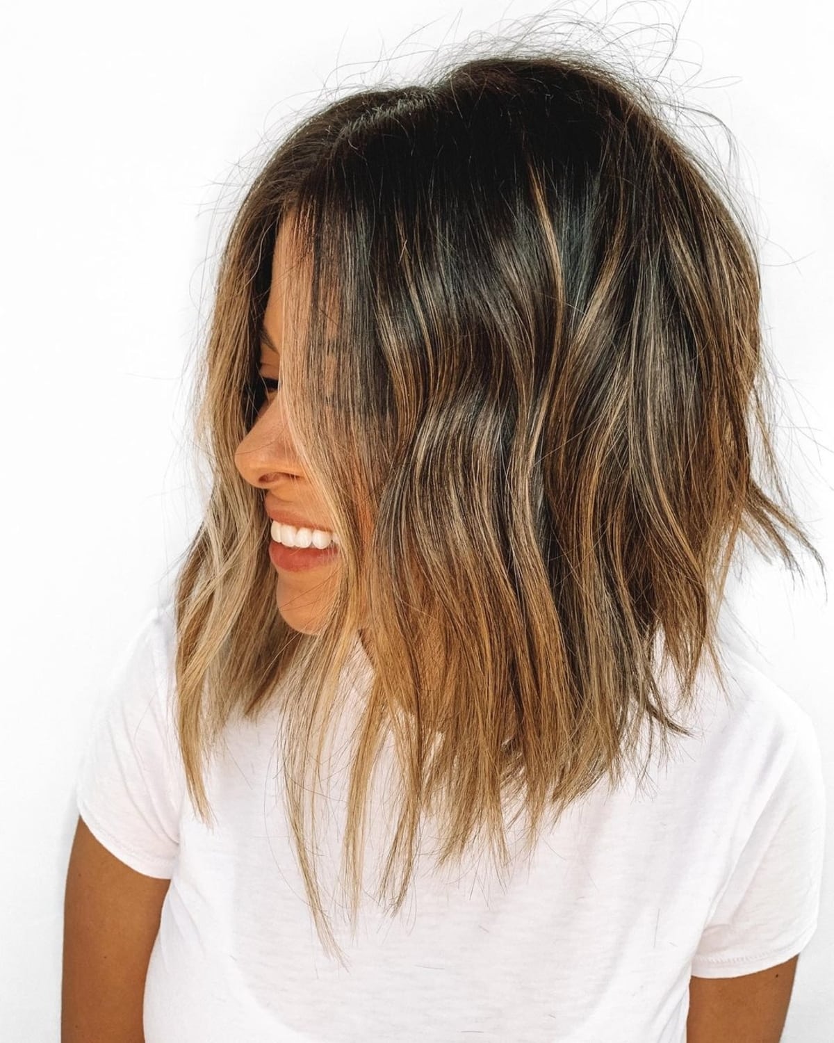 Medium to short layered haircut