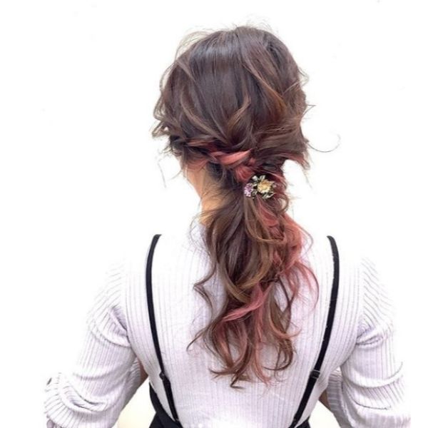  Messy Braided Ponytail with Pink Highlights