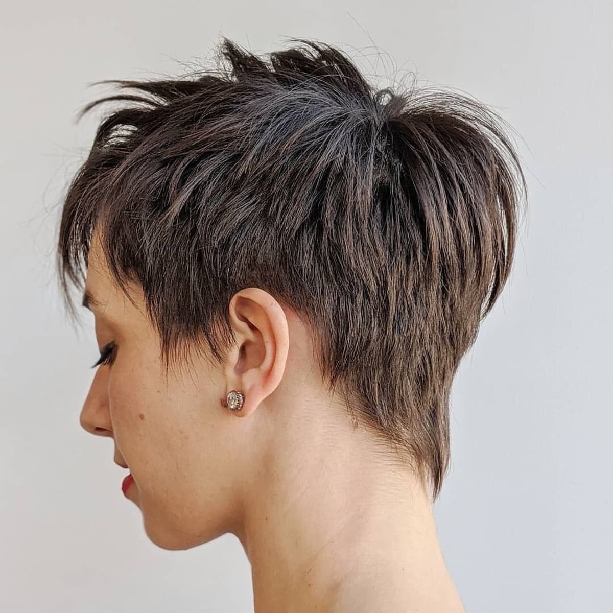 Messy razored short to medium pixie cut for straight hair