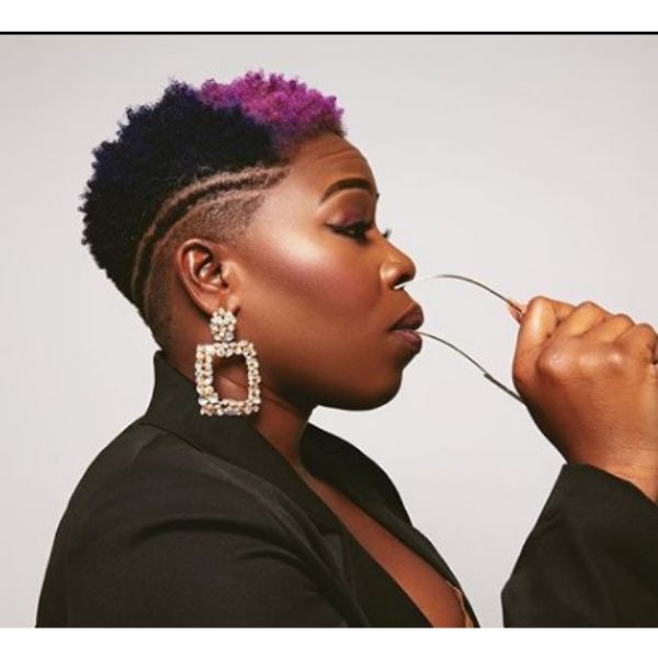 Mid Fade with Two-colored Curly Top Hairstyle