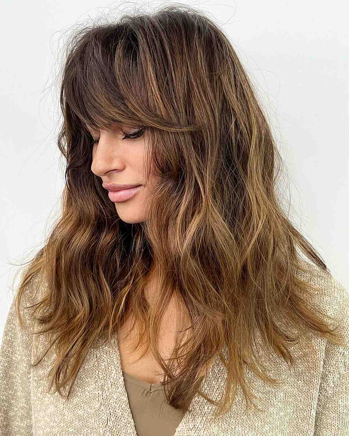 Mid-Length Thick Bronde Shag Cut