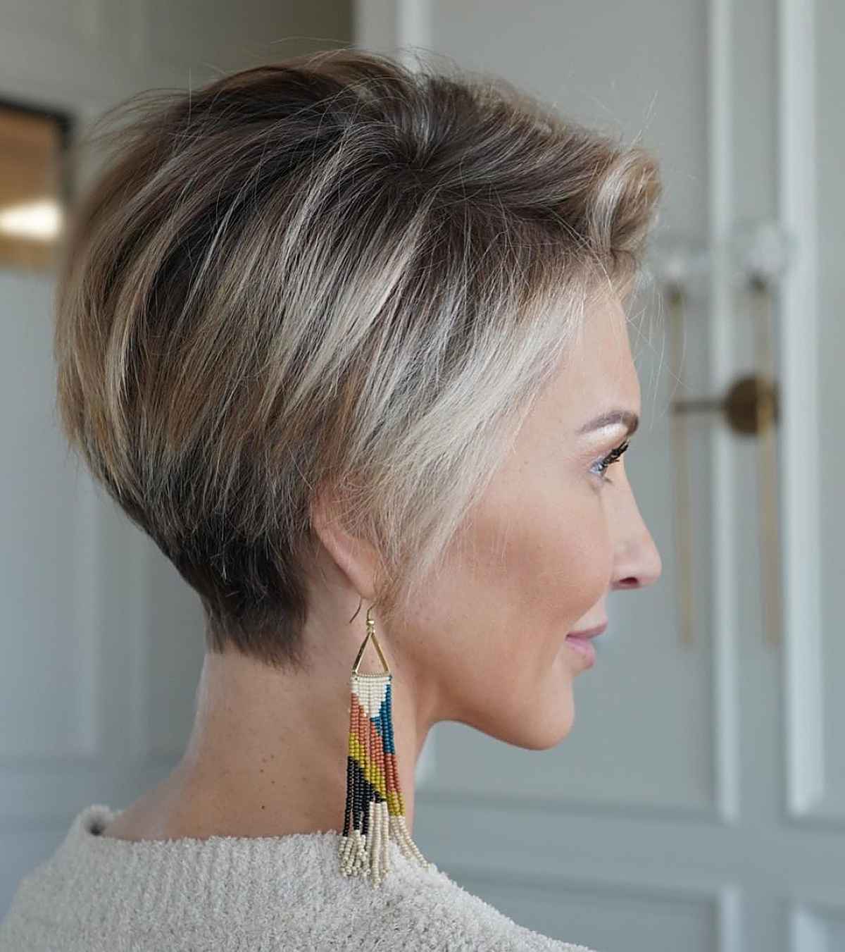 modern long pixie with a smudge root and highlights
