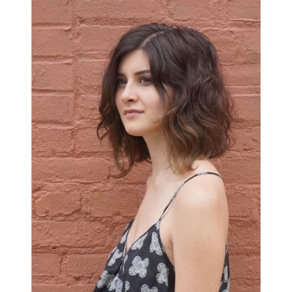  Modern Medium Shag Haircut For Wavy Hair with Side Part