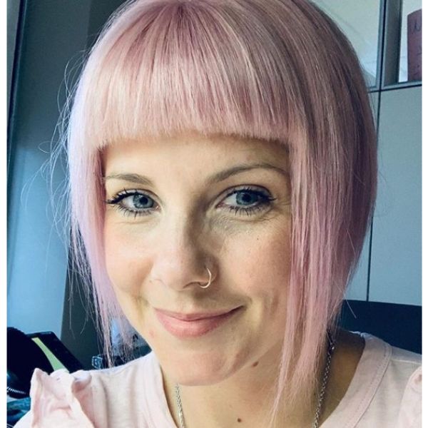 Pastel Pink Bob Hairstyle with Straight Bangs