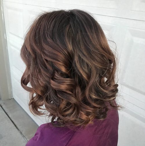 Picture of a dreamiest curled shoulder-length hair