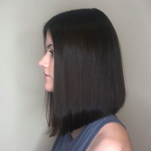 Picture of a jet black blunt shoulder-length hairstyle