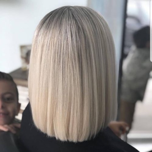 Picture of a perfectly straight ash blonde shoulder-length hair