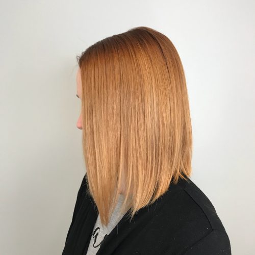 Picture of a strawberry copper angled shoulder-length bob