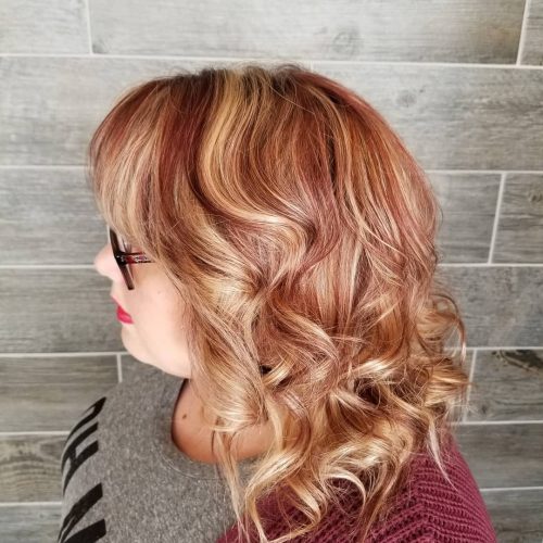 Picture of a strawberry swirls curled hair