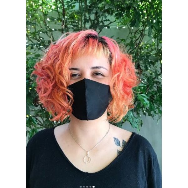 Pink Orange Curly Bob With Baby Bangs