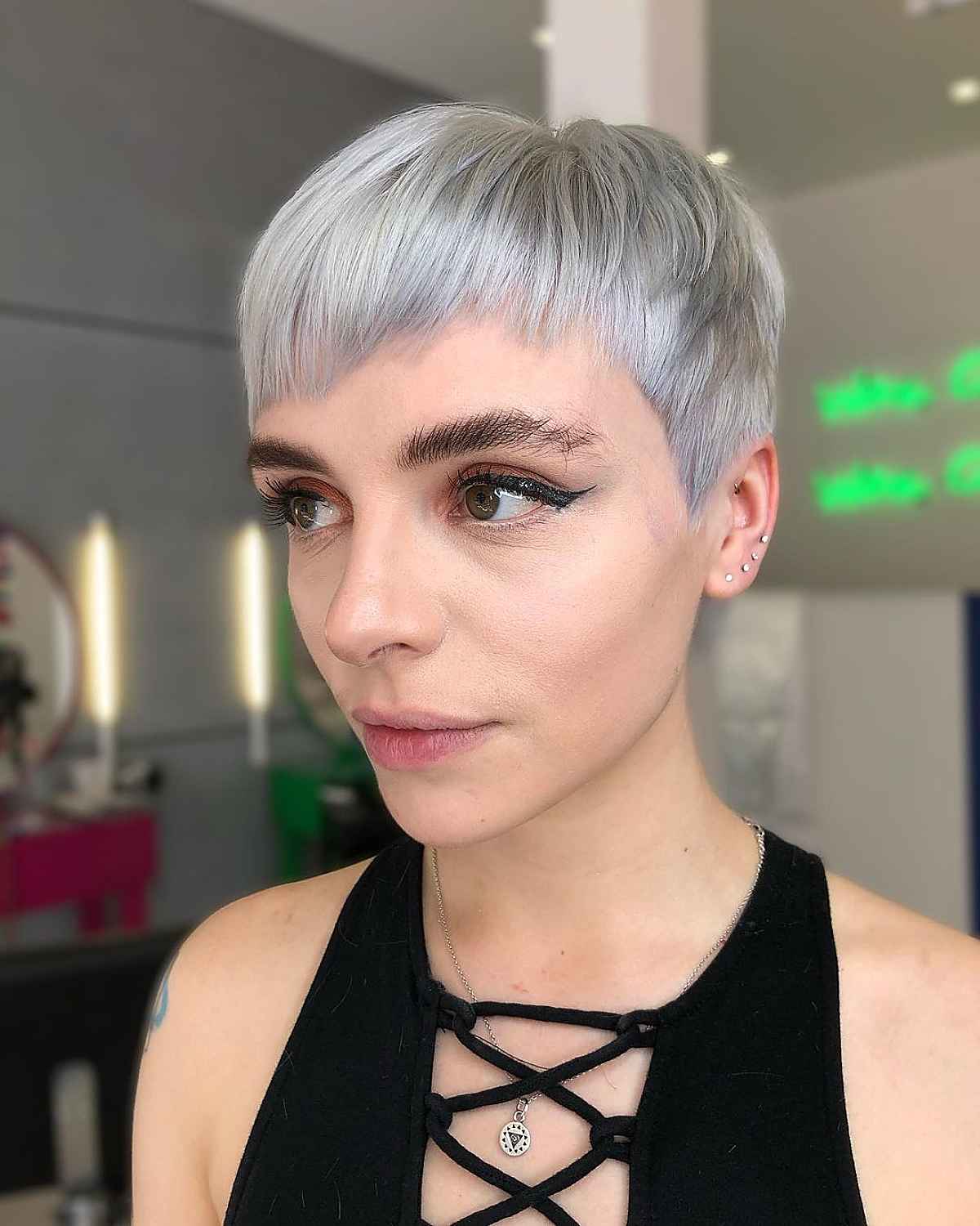 pixie cut with straight bangs hairstyle