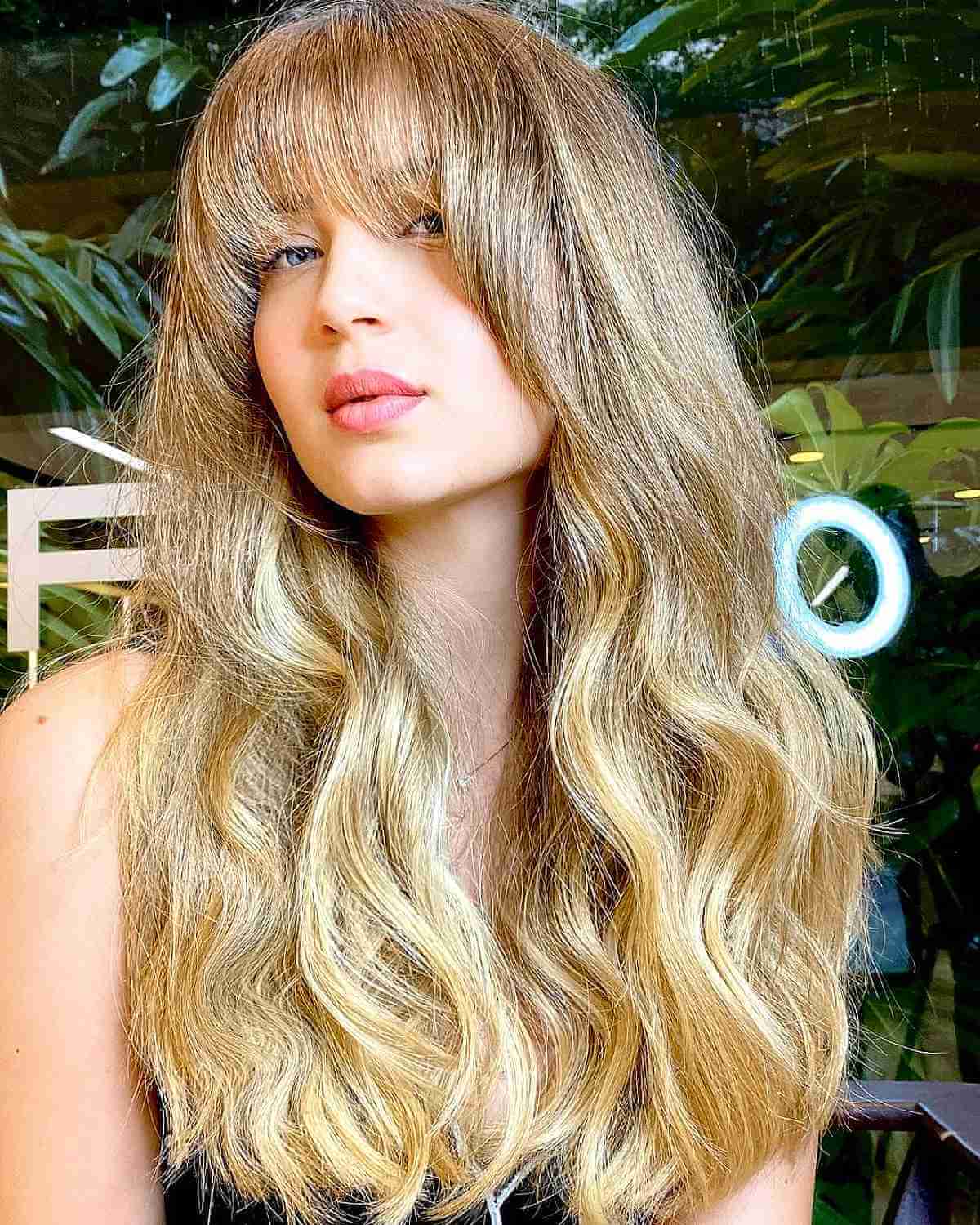 Radiant Long Wavy Hair with Bangs