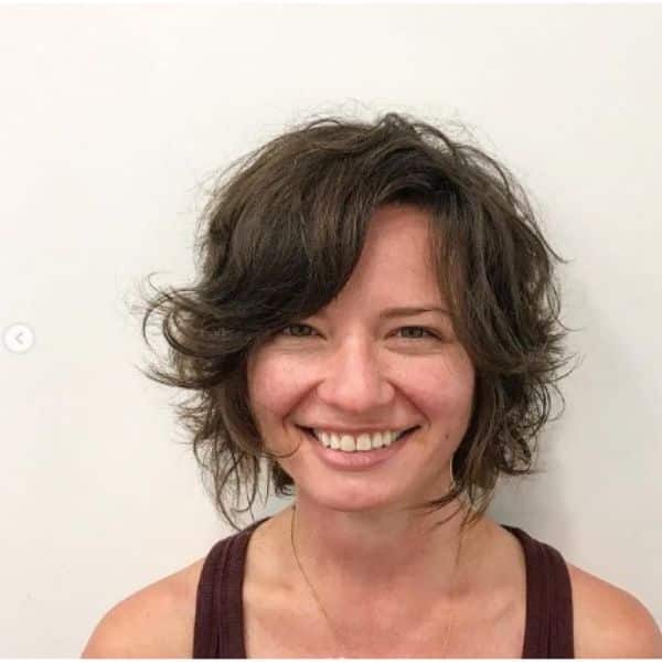 Razor Curly Bob With Side-swept Bangs Hairstyle