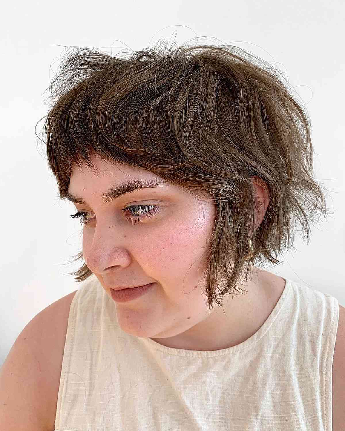 Razor Cut Jaw-Length Bob with Shaggy Layers and Bangs