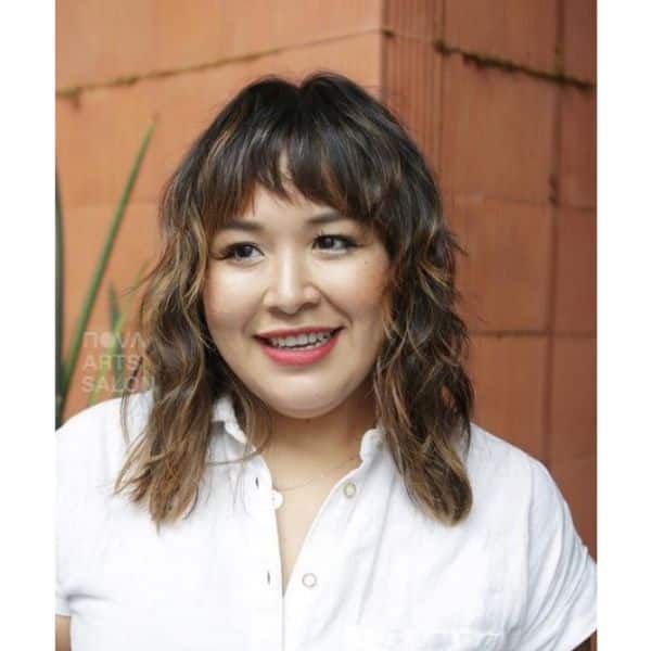 Shaggy Medium Haircuts For Wavy Hair with Short Bangs