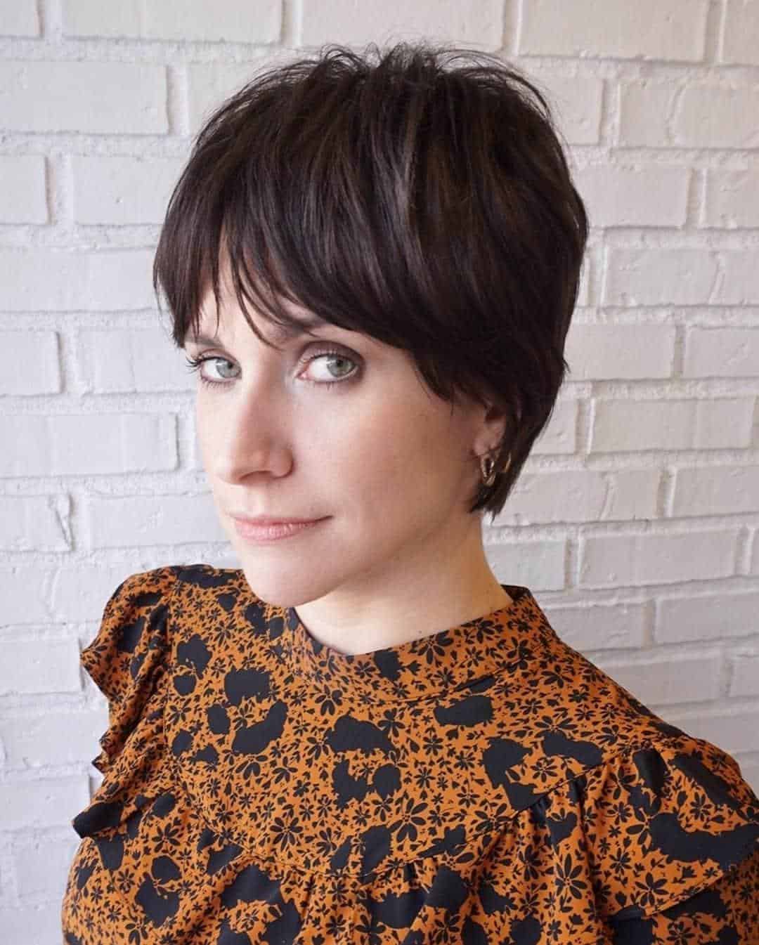 shaggy pixie cut with long bangs