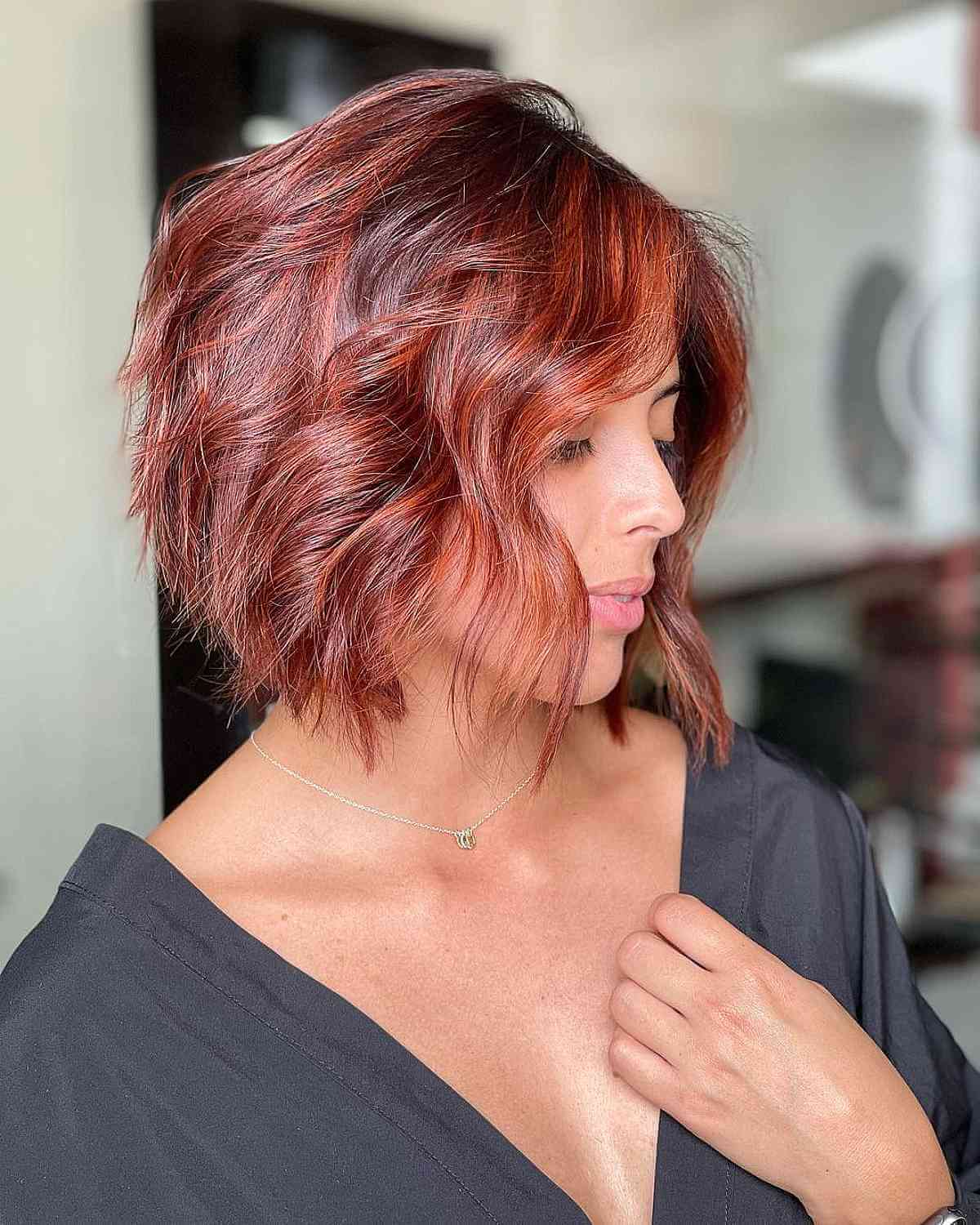 Short Angled Bob Cut with Textured Waves for Thick Hair