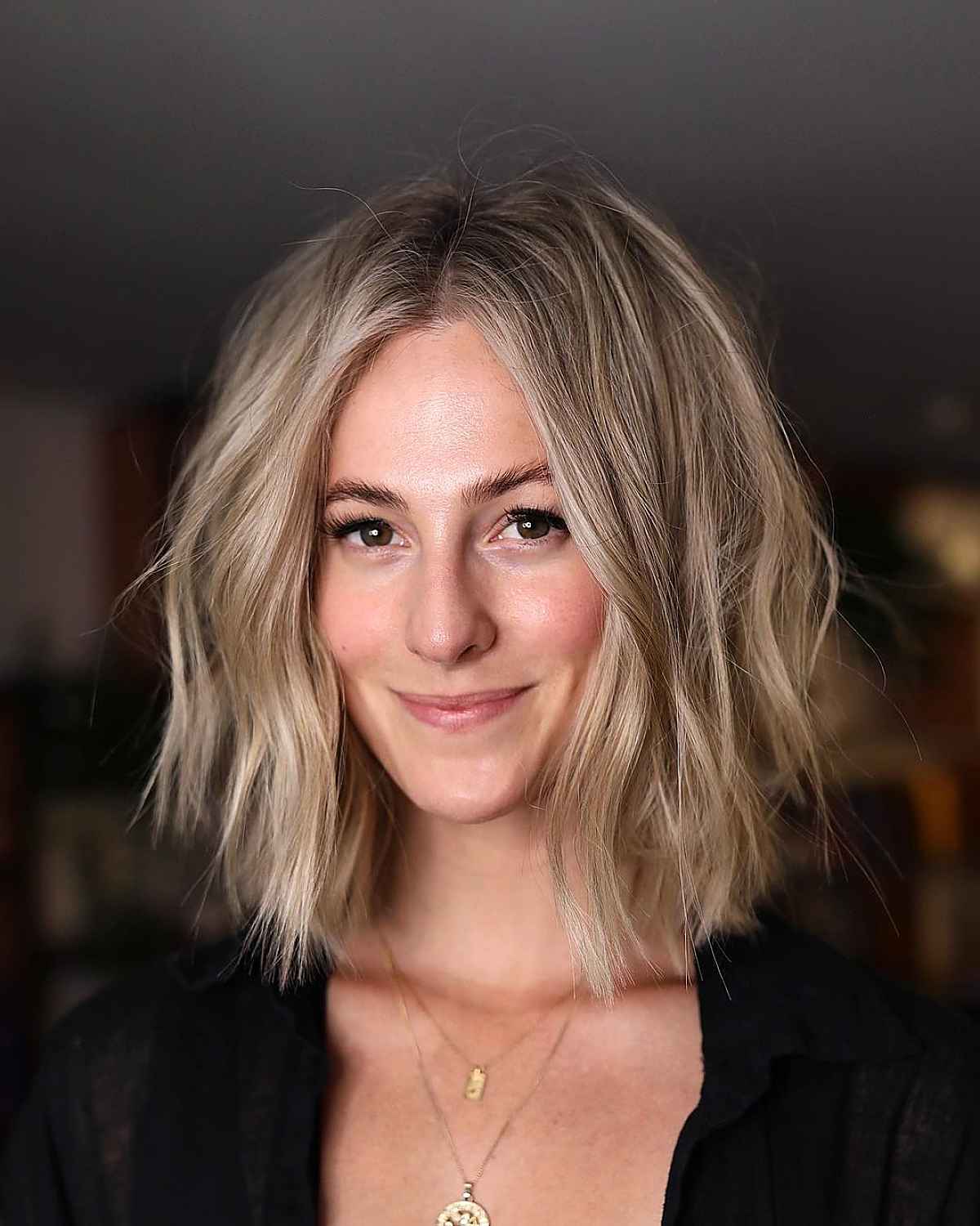 Short blunt bob with beach waves