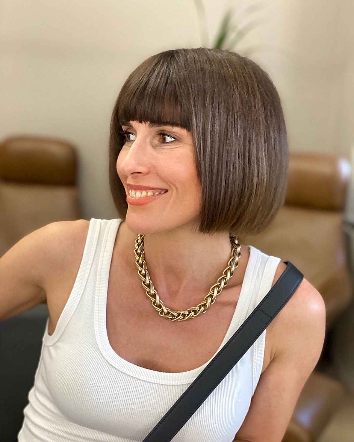 short brown bob with bangs haircut