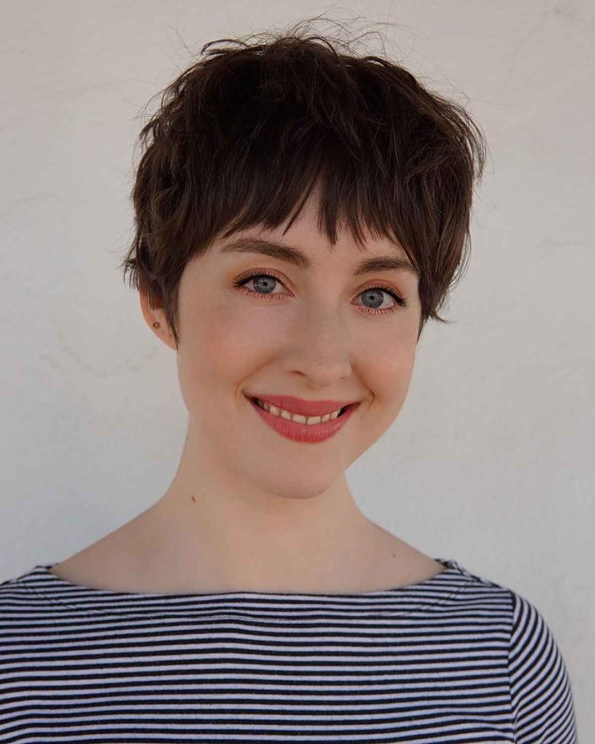 short brown pixie cut with bangs