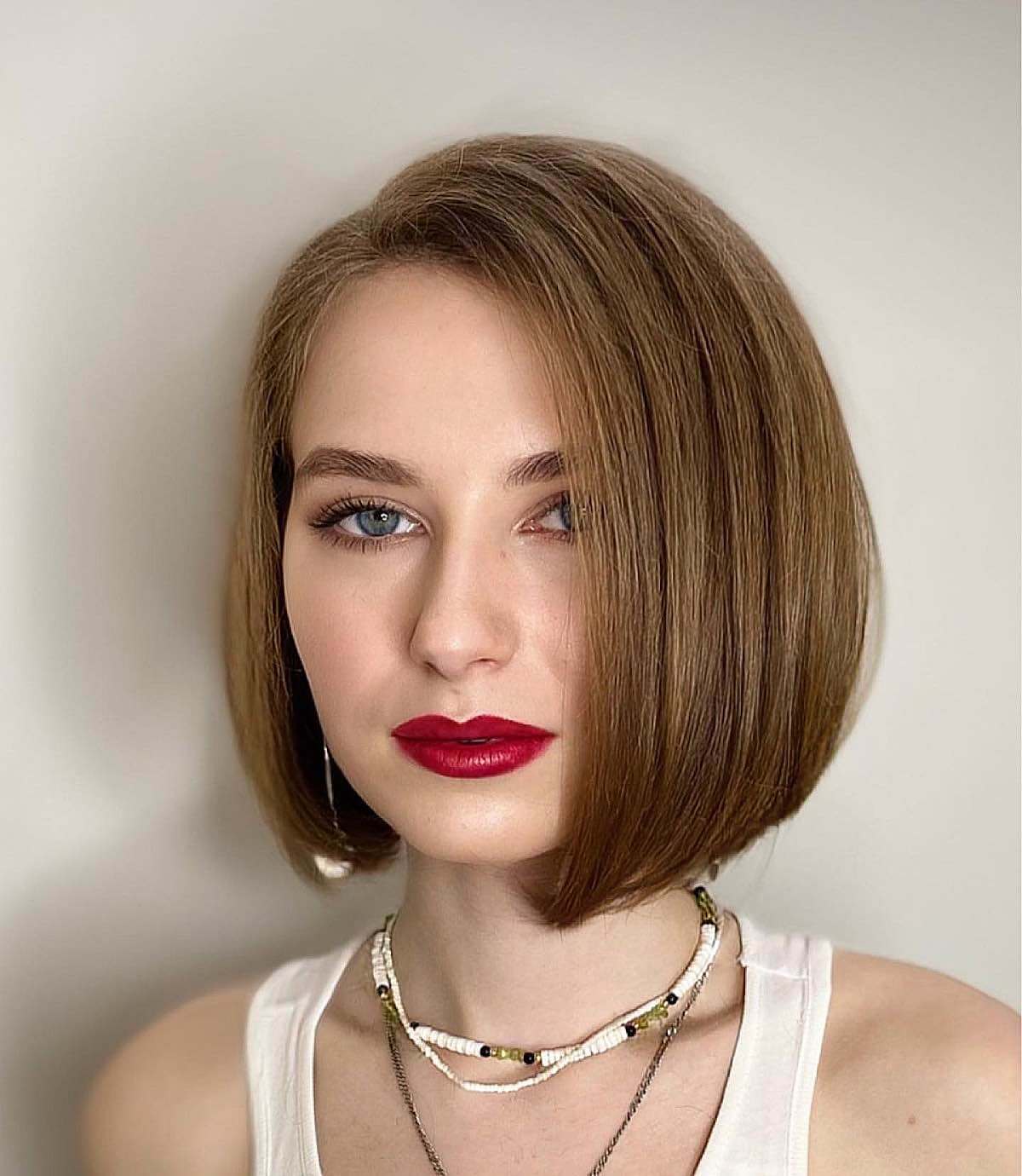 short brown sleek bob with no bangs