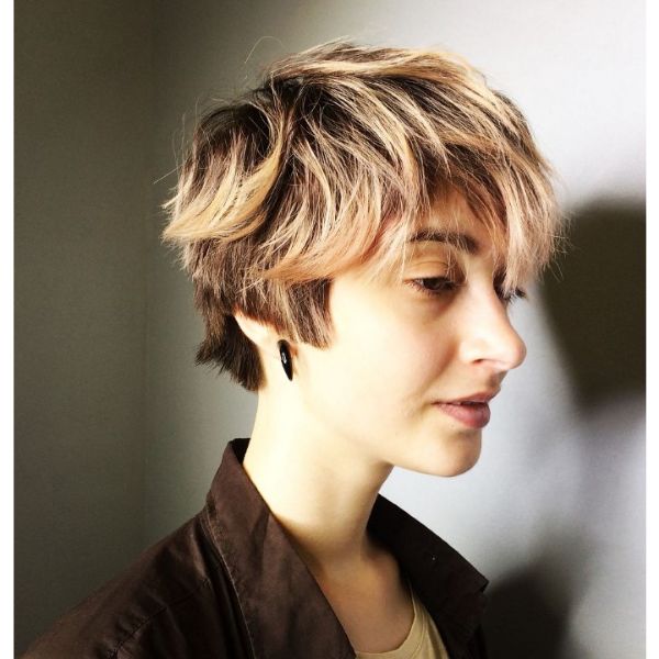 Short Layered Blonde Hairstyle With Messy Bangs