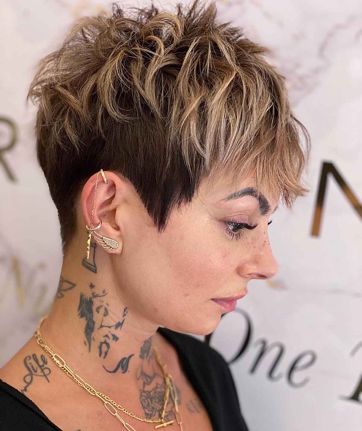 short pixie with blonde balayage