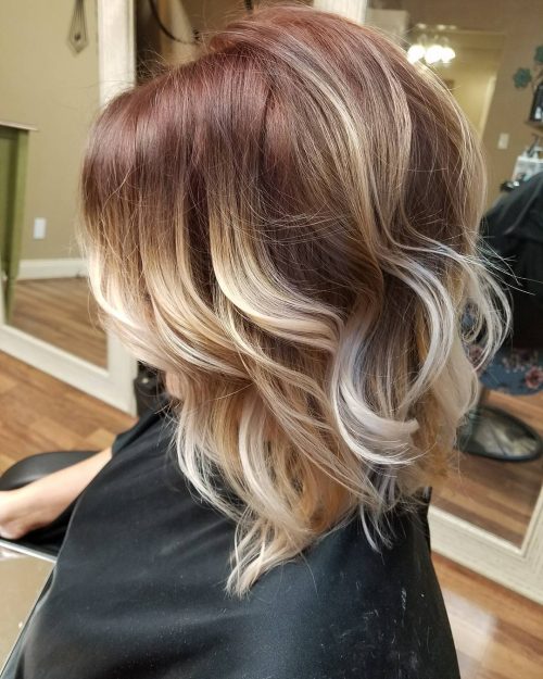 Short wavy bob with a red to Blonde Ombre