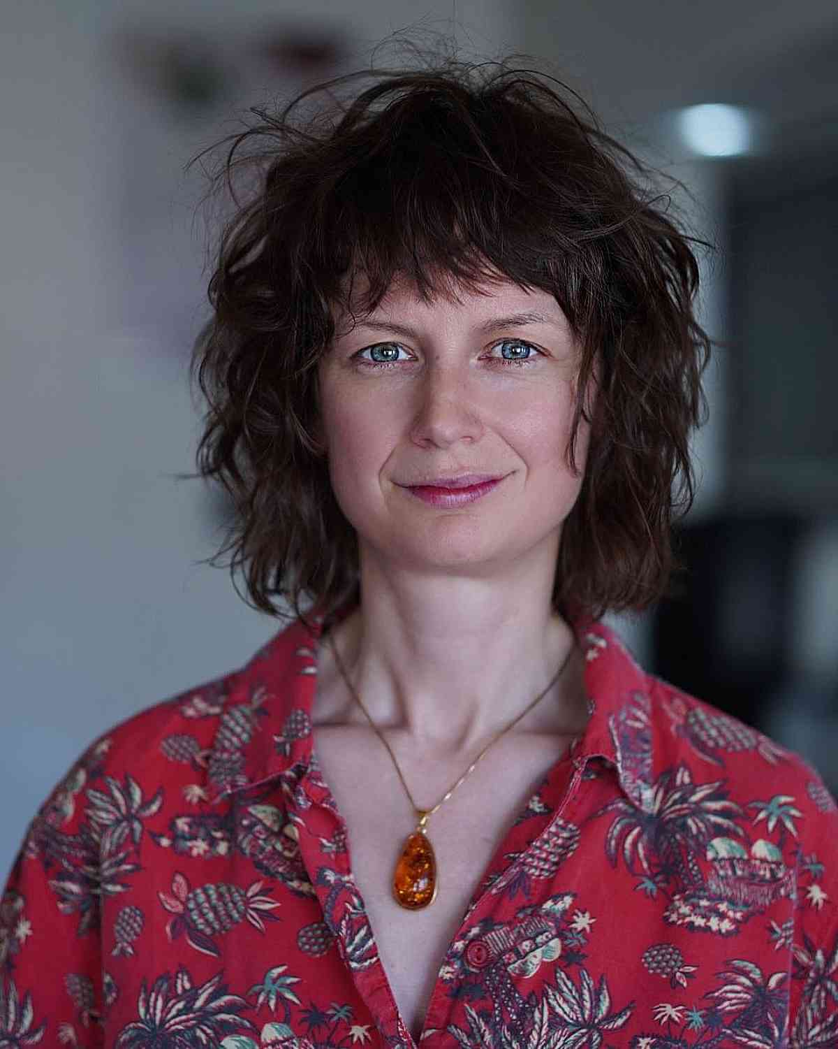 Short Wavy Thick Tousled Layers and Bangs for Square Faces