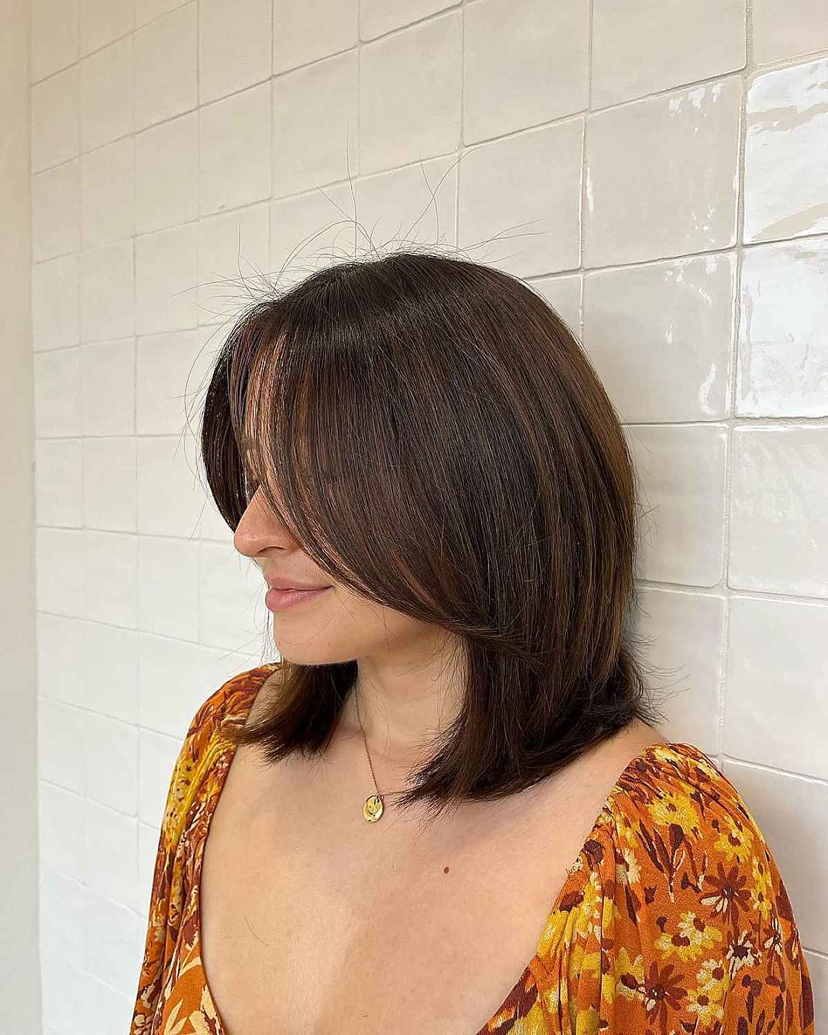 Shoulder-Length Cut with Long Bangs