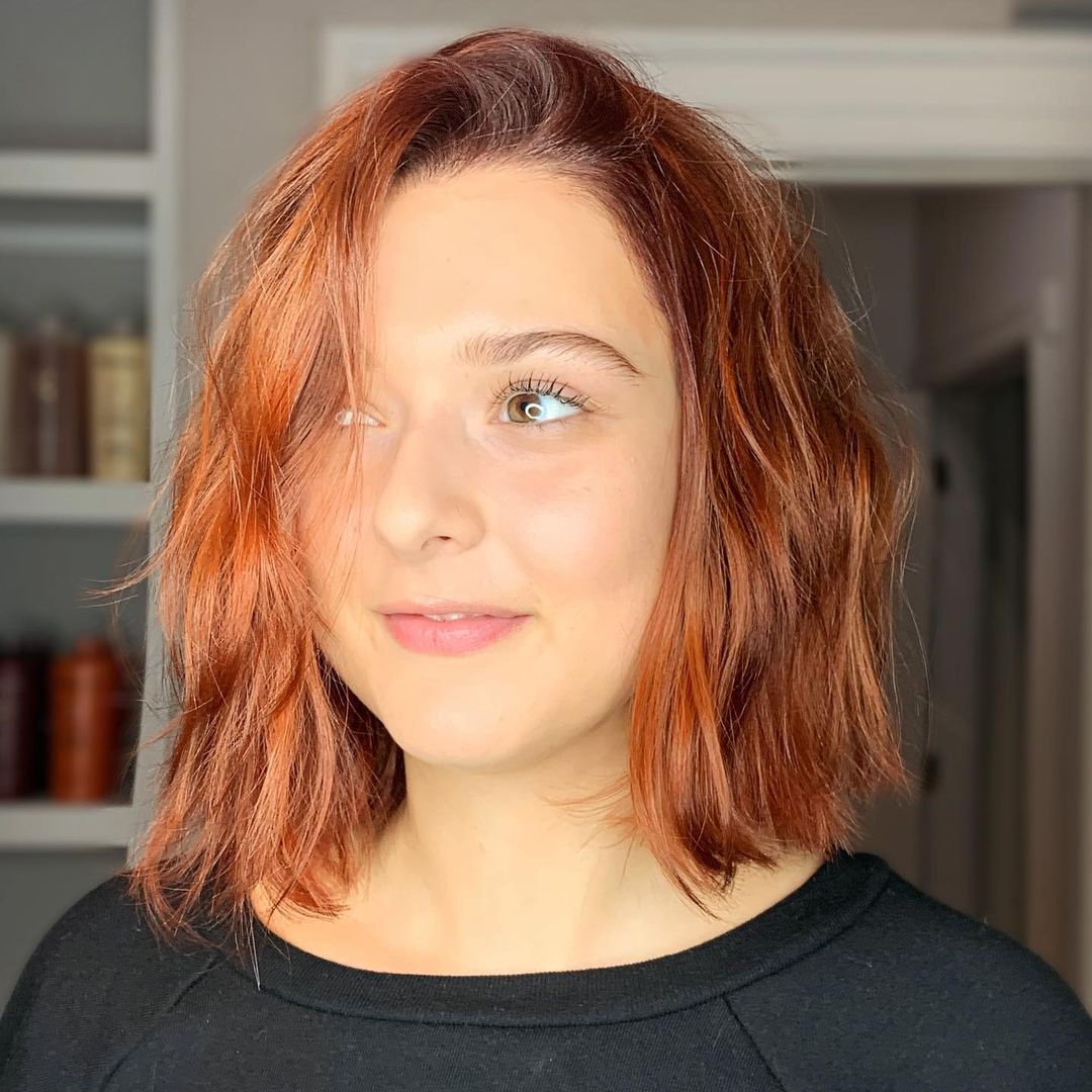Side-Parted Long Bob on a woman with a round face