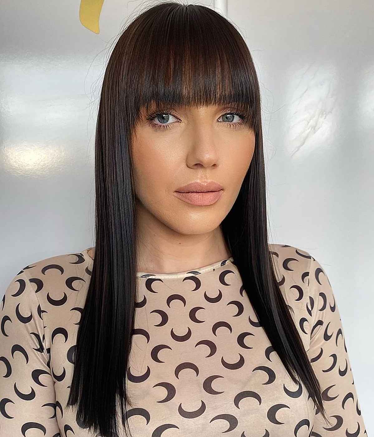 Sleek Long Hair with Straight-Across Bangs