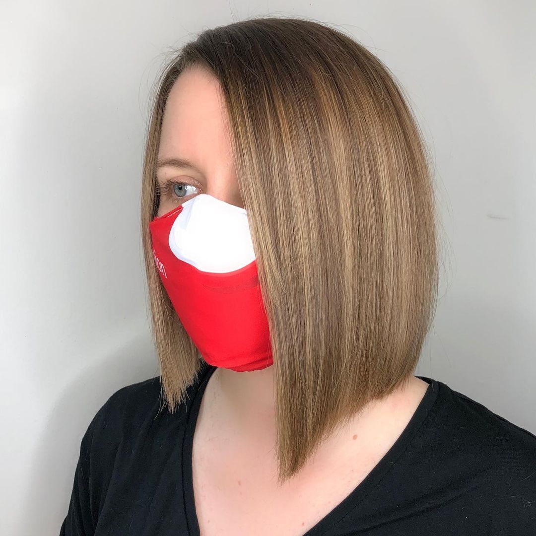 sleek short asymmetrical bob for women with fine hair